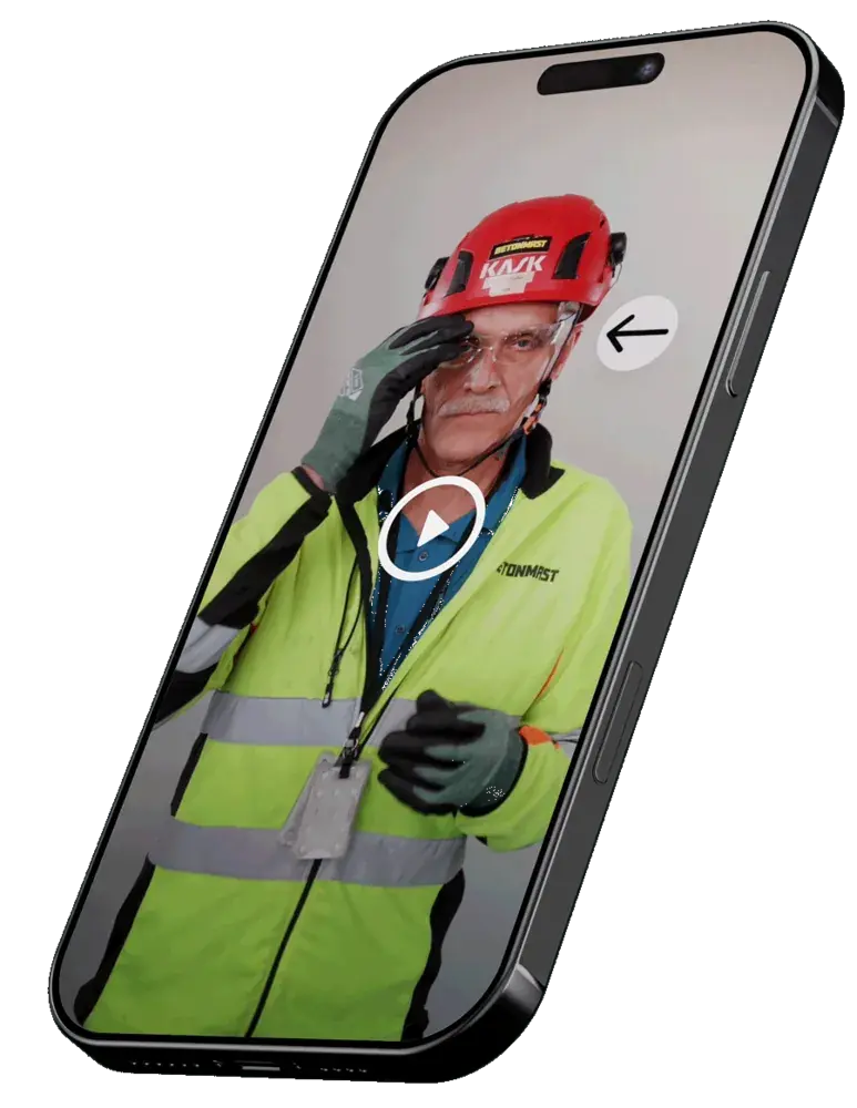 Mobile phone showing a safety video with a Betonmast worker